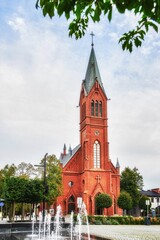 Fototapeta na wymiar church, architecture, tower, building, city, cathedral, religion, Europe, sky, old, brick, town, landmark, travel, roof, historic, red, house, medieval, germany, poland, history, gothic, castle