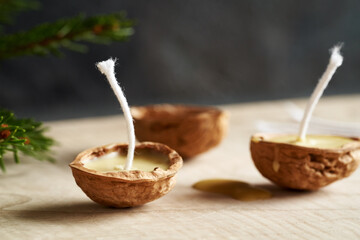 Preparation from Christmas candles from bees wax and nut shells
