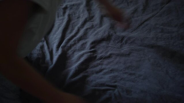 Woman donates her clothes. Sale of used clothes. Donation. Woman folds clothes, close up. Moving to a new house, putting things in boxes. Home routines, clothing storage, stack clothing