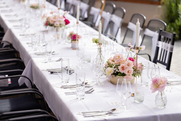 Wedding table with pink flowers