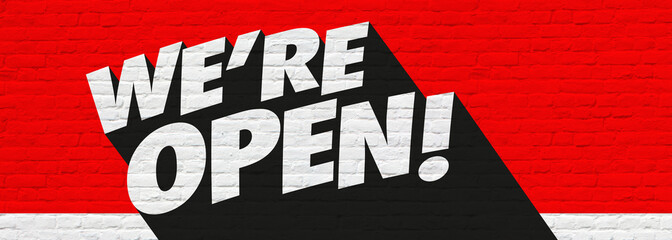 We're open on red bricks background