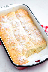 traditional Czech stuffed buns in baking tray
