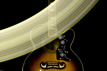 Guitar in the dark with stripes of light long exposure