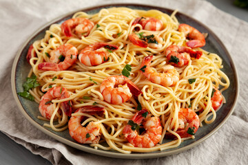 Homemade Cooked Garlic Shrimp Scampi on a Plate, side view.
