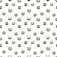 Fototapeta premium Creepy Halloween wallpaper with pumpkin face. Seamless pattern. Vector
