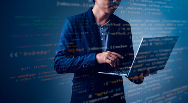 Businessman with software, data hologram and code analytics, information technology, and gdpr overlay. Programmer coding or IT person reading html script, programming, and cyber security research
