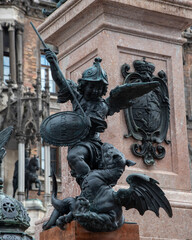 Putto by Ferdinand Murmann at corner of Mary's column in Marienplatz in Munich