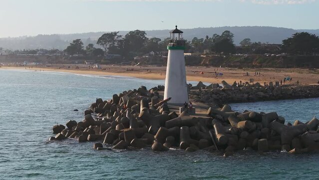 Beautiful lighthouse by the Pacific ocean near the town of Capitola, USA. Magical sunset by the lighthouse.