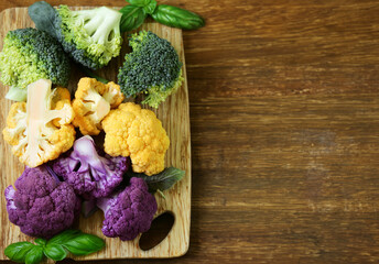 colorful broccoli cabbage on a wooden board