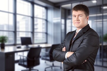 Smiling confident business man standing in office, AI generated image