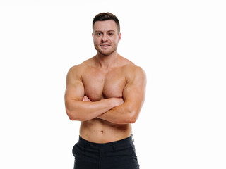 A Confident Man Striking a Pose With Arms Crossed. A man with his arms crossed posing for a picture