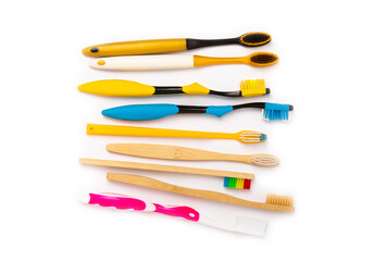 Electric, bamboo and ordinary toothbrushes isolated on white background. Oral hygiene. Eco. Prevention of caries. Dental car. The concept of dentistry and eco-friendly lifestyle.
