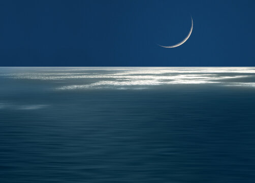 Crescent moon over ocean, Malta
