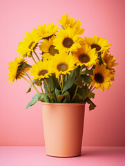Photo of perfect yellow sunflower in pink pot