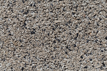 Crushed granite stones wall - close up