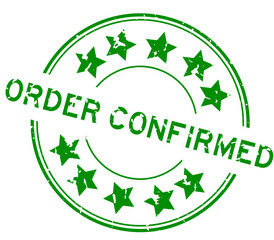 Grunge green order confirmed word with star icon round rubber seal stamp on white background