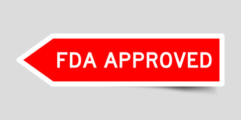 Red color arrow shape sticker label with word FDA approved on gray background