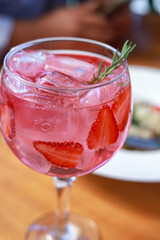 red cocktail with ice