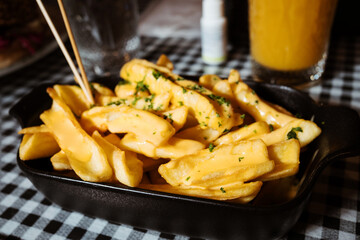 French fries potato chips cheese sauce