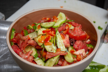 Cucumber salad with tomatoes, cheese,