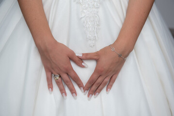 the bride shows her engagement ring Wedding and manicure