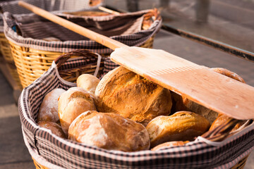 Ready made rolls of freshly baked cereal bread in basket