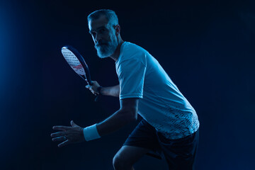 Padel tennis player in social media template. Man athlete with paddle tenis racket on blue...