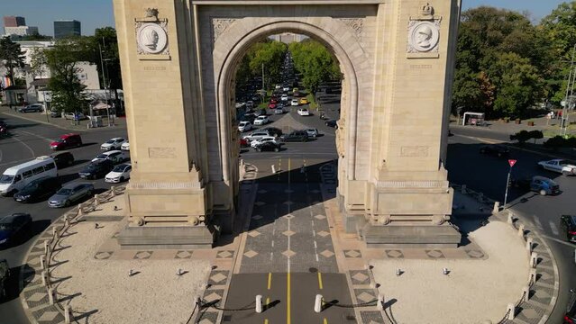 High Angle drone footage of the Arc de triumf in the capital of Romania - Bucharest.

