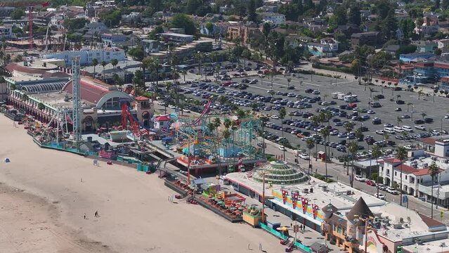 Aerial view of the Santa Cruz holiday town by the Pacific coast in the USA. Historic Santa Cruz Beach Boardwalk. The oldest outdoor amusement park in California.
