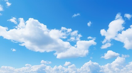 Serene Skies: Fluffy White Clouds Against Brilliant Blue Sky