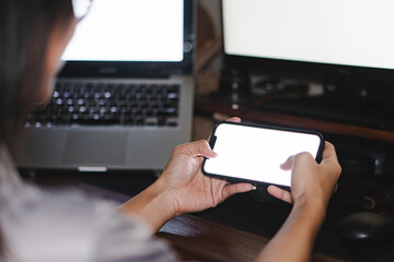 Mockup image of woman's hands holding black mobile phone with blank screen