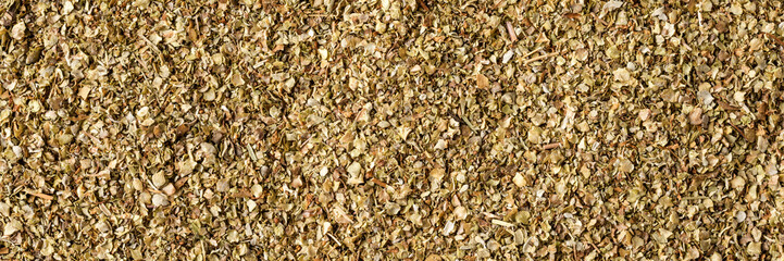 Dried marjoram texture. Background with copyspace. Close up. Top view