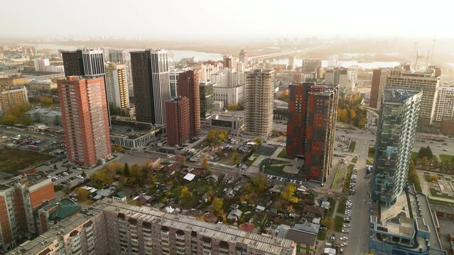Aerial view of the city block with residential buildings from the height of the flight. The central district of the city of Novosibirsk.