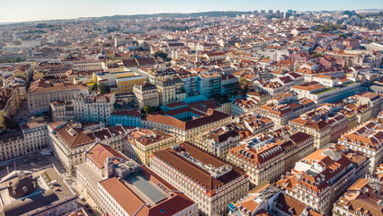 Naklejka premium Aerial drone perspective of Lisbon - Portugal. Rooftops of Lisbon. Travel destination and capital of Portugal city visited annually by many foreign tourists.