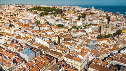 Aerial drone perspective of Lisbon - Portugal. Rooftops of Lisbon. Travel destination and capital of Portugal city visited annually by many foreign tourists.