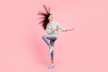 Full body photo of pretty positive malaysian person have fun dancing clubbing isolated on color background