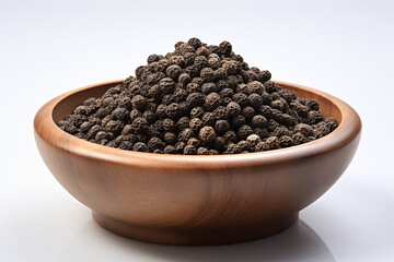 Ground pepper in a wooden bowl