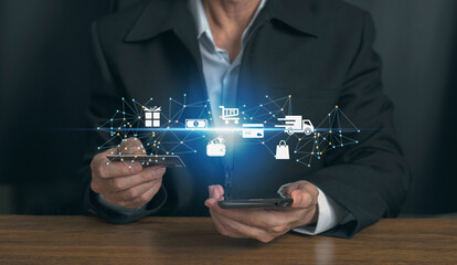 Online shopping and e- commerce technology internet concept, businessman using smartphone with shopping and business icon, shopping service on the online web and offers home delivery.