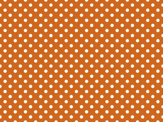 texturised white color polka dots over chocolate brown backgroun