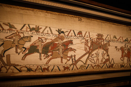 BAYEUX, FRANCE - AUGUST 25, 2022 Detail of the Bayeux Tapestry depicting the Norman invasion of England in the 11th Century
