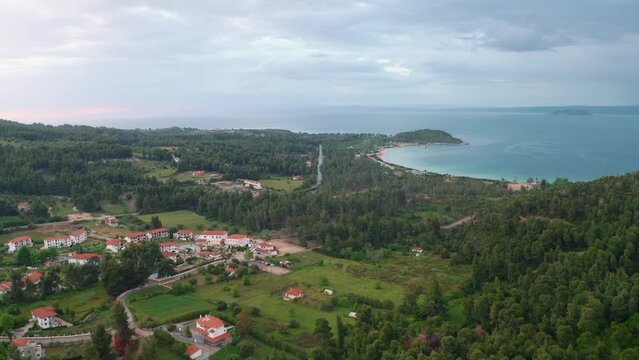 Aerial drone view of Paliouri Beach in Kassandra Sithonia penisula  Chalkidiki Greece Aerial drone view of Paliouri Beach Chrousso Village in Kassandra Sithonia penisula  Chalkidiki Greece
