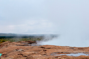 Natural power erupts over breathtaking landscape.