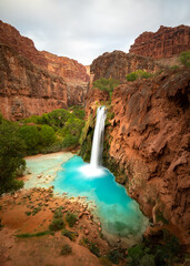Fototapeta na wymiar Incredible Natural Turquoise Waterfall in Grand Canyon Arizona