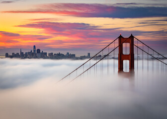 San Francisco Golden Gate Bridge Over Thick Fog at Sunset