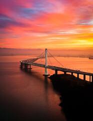 Fototapeta na wymiar SF Bay - Bay Bridge East Span During Colorful Sunrise 