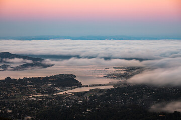 Thick / Dense Fog Rolling Over Hills / Homes in San Francisco Bay