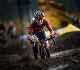 Professional female cyclist during a cyclocross competition