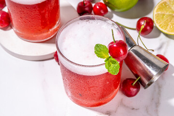 Cherry and lime alcoholic booze cocktail