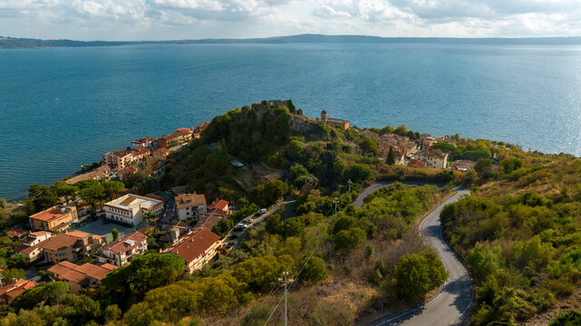 Aerial view of the remains of the ancient Orsini fortress located in Trevignano Romano, in the metropolitan city of Rome, Lazio, Italy. It overlooks Lake Bracciano.