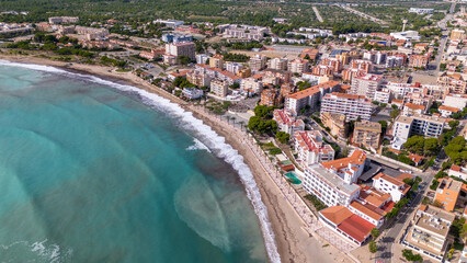 Aerial drone photo of the coastal town and beach in L'Hospitalet de l'infant in Spain